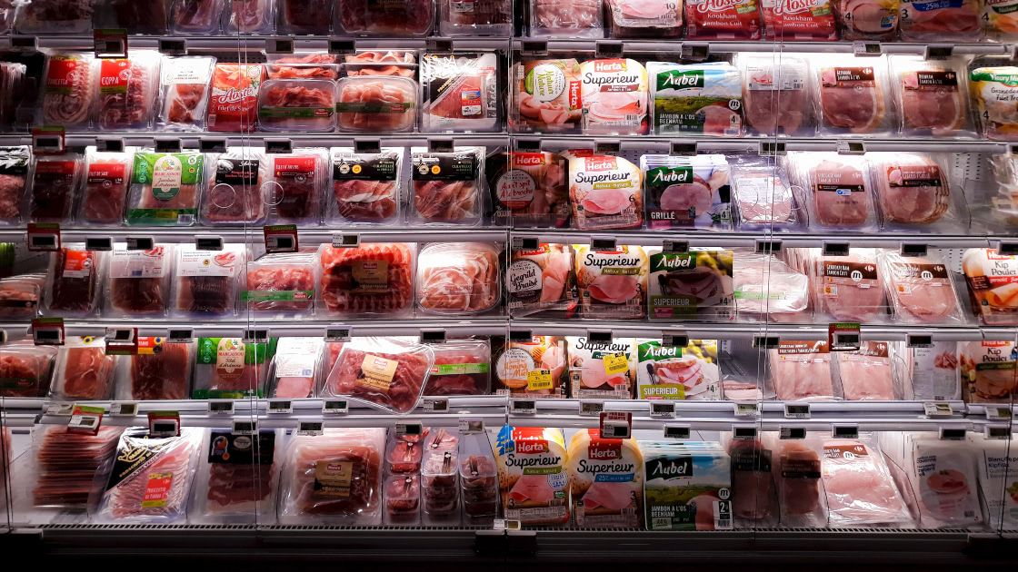 Packaged meat in a food display fridge